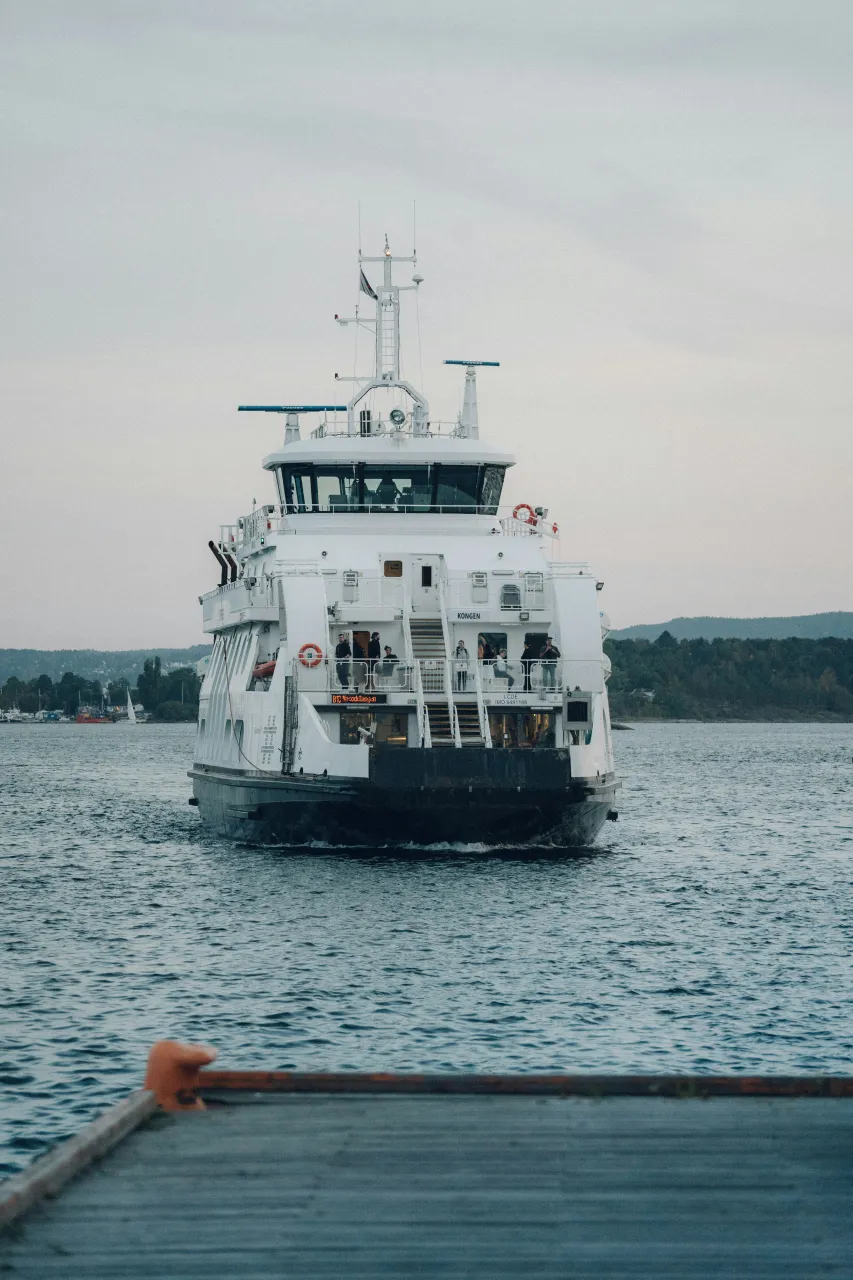 Public ferry crossing the Oslofjord with islands visible in the background