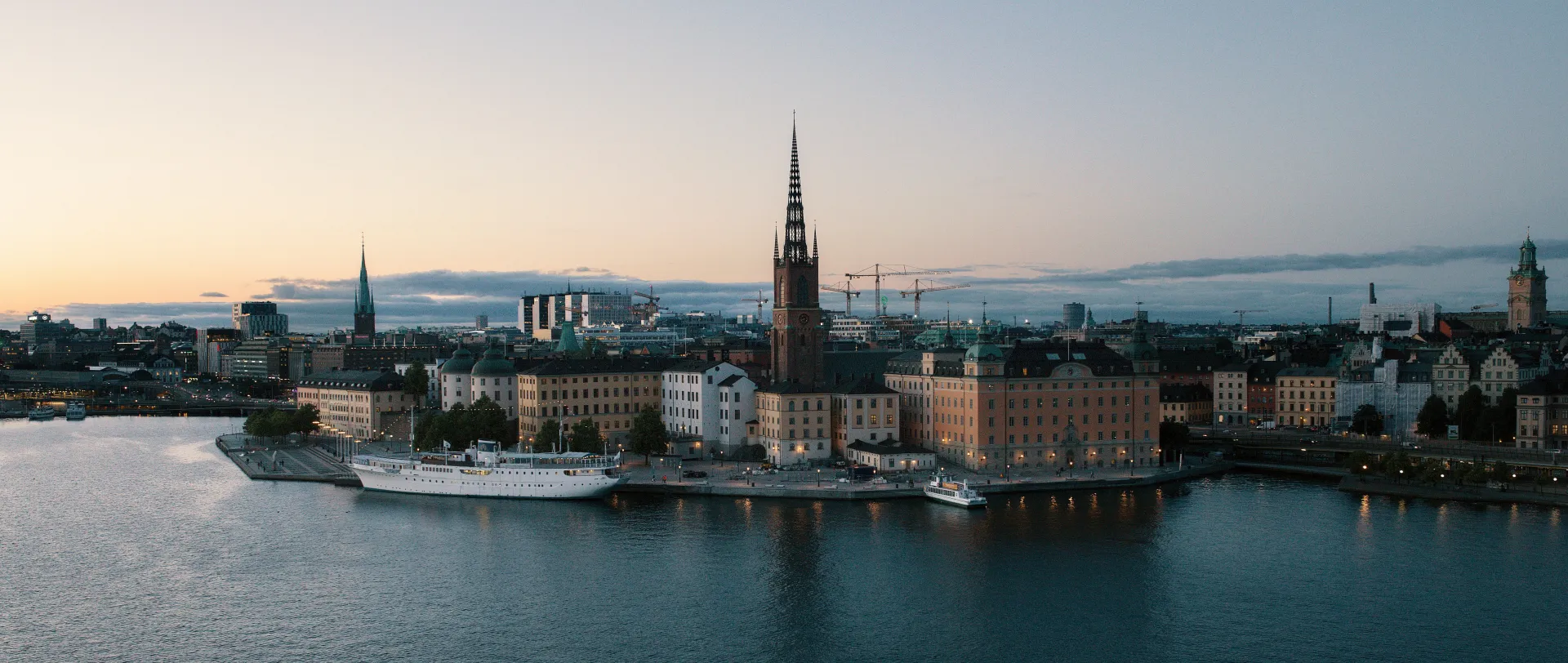 Stockholm skyline across the water at sunset