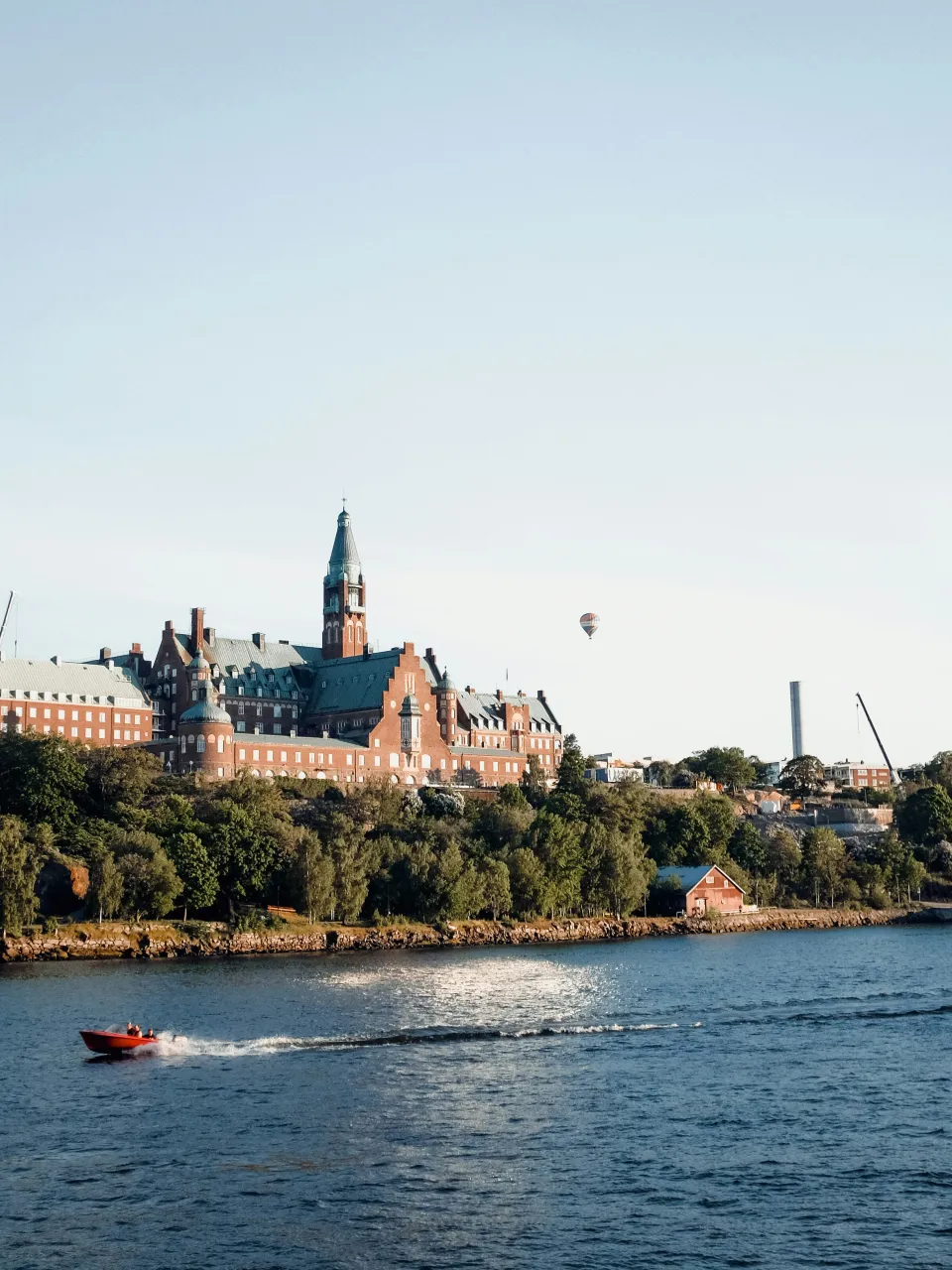 Stockholm waterfront view with boat traffic and historic skyline from the water